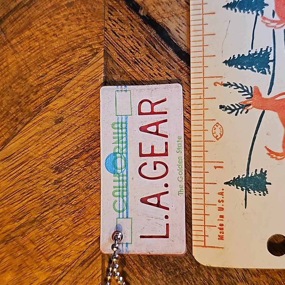 Vintage L.A. Gear shoes license plate keychain